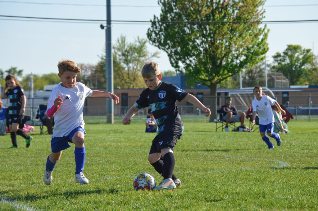 Youth soccer players training together